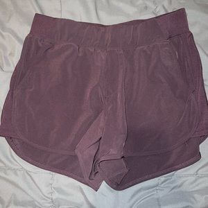 maroon colored athletic shorts